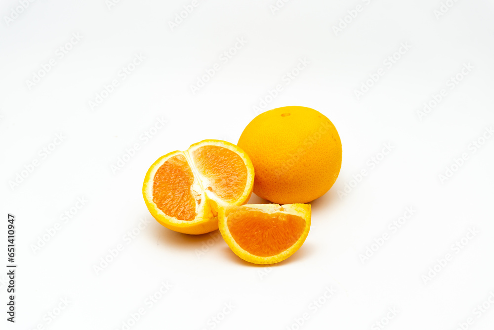 Orange with cut in half isolated on white background. Orange with cut in half isolated on white background.