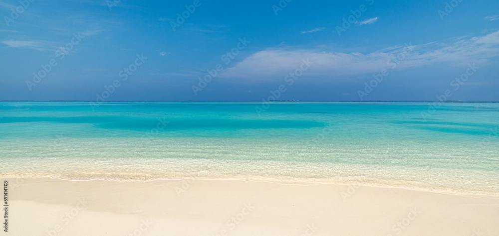 Closeup of sea waves beach blue summer sky. Panoramic beach landscape. Mediterranean sandy coast seascape. Blue sky inspire calm tranquil relaxing sunlight. Travel destination, popular vacation banner