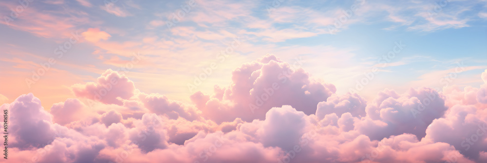 Beautiful background image of a romantic blue sky with soft fluffy pink clouds. Panoramic natural view of a dreamy sky