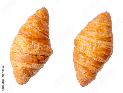 Top view of two separated fresh croissants isolated on white background with clipping path in png file format