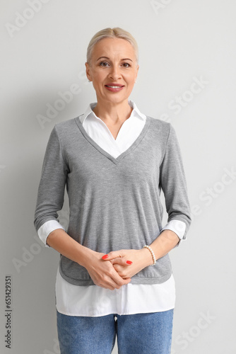 Mature blonde woman on ligh...