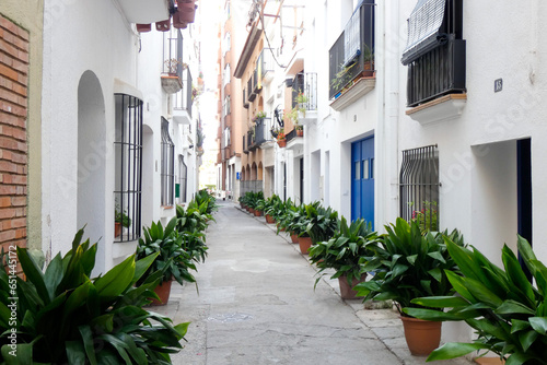 Narrow streets in the old quarter of the Mediterranean town of Blanes in the province of Barcelona, Catalonia, Spain.