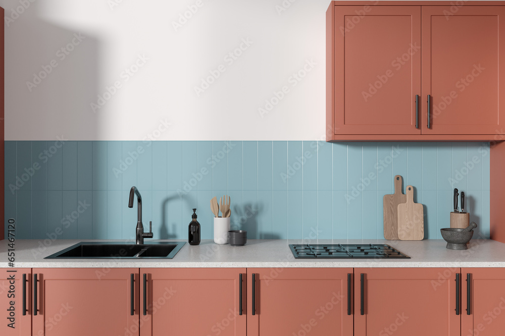 Minimalist home kitchen interior with cooking space, kitchenware on counter Minimalist home kitchen interior with cooking space, kitchenware on counter