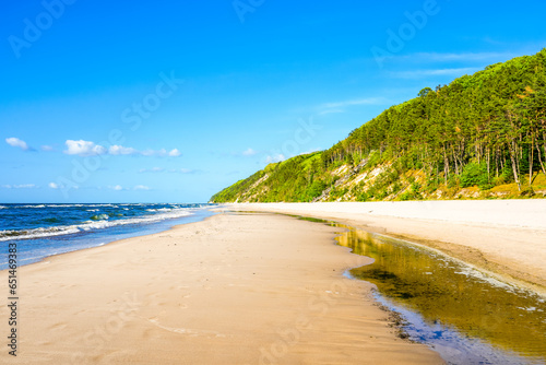 Fototapeta Naklejka Na Ścianę i Meble -  Baltic Sea beach near Misdroy. Seaside resort on the Polish coast. Landscape on the beach.
