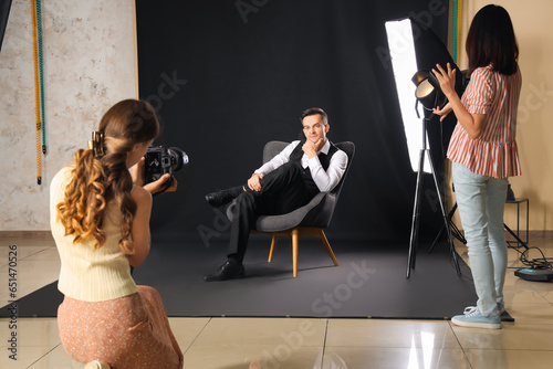 Female photographer and her...