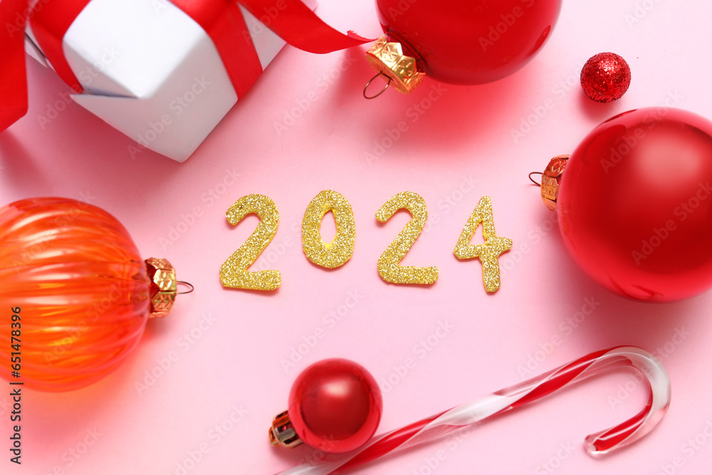 Figure 2024 With Christmas Decorations And Gift Box On Pink Background   1000 F 651478396 664h6O79lQeNm3skzQ5jOqFRDNibhh4U 