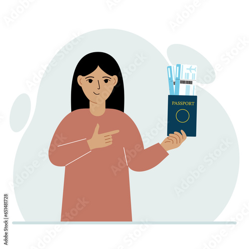 A woman holds a passport with air tickets. The woman shows the boarding pass. Travel concept.