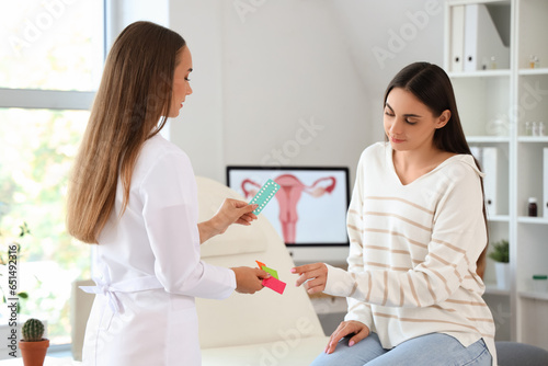 Female gynecologist giving ...