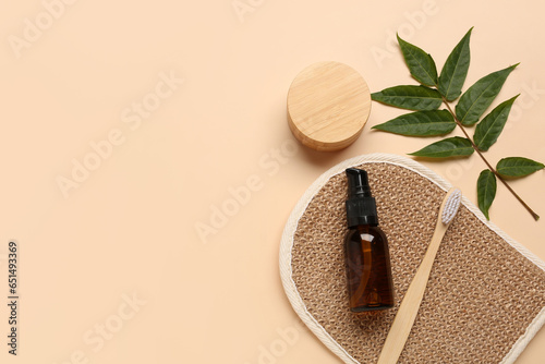 Composition with bath supplies, cosmetic products and plant leaf on color background