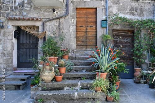 The facade of an old house in the medieval district of Vitorchiano, a village in Lazio in the province of Viterbo, Italy.
