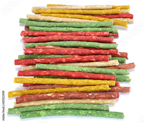 dog treats made from natural ingredients in the form of sticks of different colors