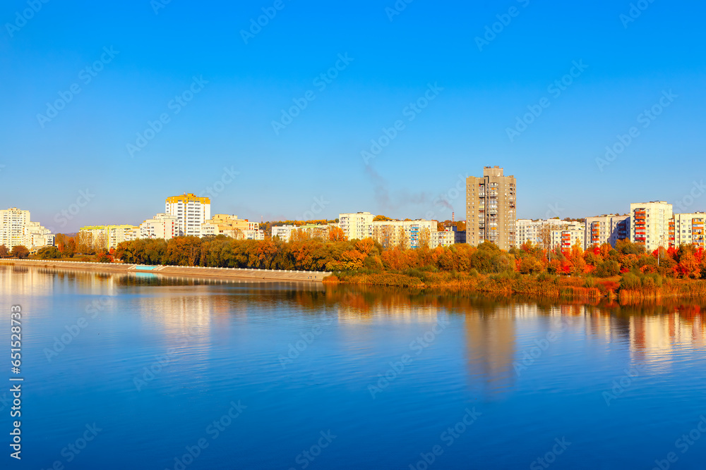 Coastal city in the autumn . City houses along the riverbank.  Rybnitsa is a town in Transnistria in Moldova
