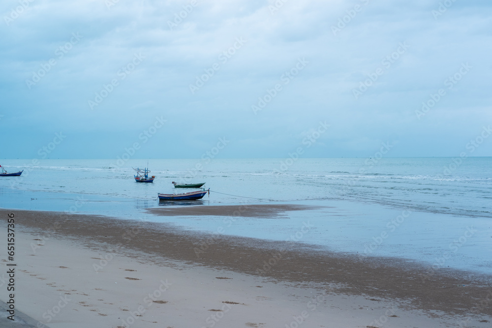 Fisherman's boats moored nearby on the beach,and beautiful clouds Fisherman's boats moored nearby on the beach,and beautiful clouds