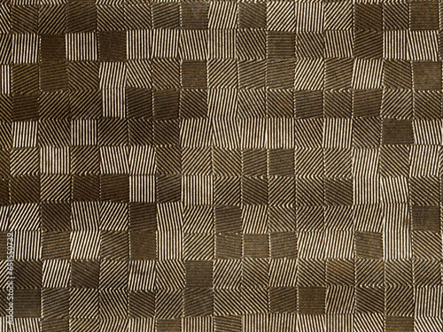 a pattern of squares drawn by lines and painted golden color