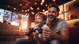 Joyful dad and son with joysticks playing video games at home