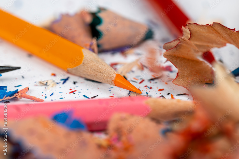 sharp pencil of different colors on paper close-up sharp pencil of different colors on paper close-up