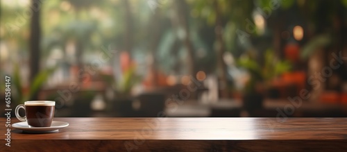 Wooden table in coffee shop for display or montage products