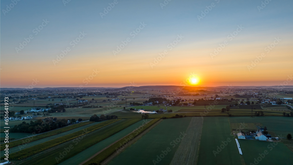 An Aerial View of an Early Morning Sunrise, Over Rural America, on a Summer Day