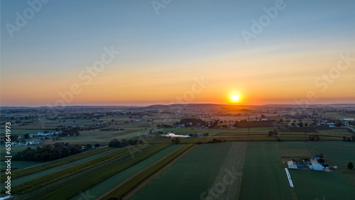 An Aerial View of an Early Morning Sunrise, Over Rural America, on a Summer Day © Greg Kelton