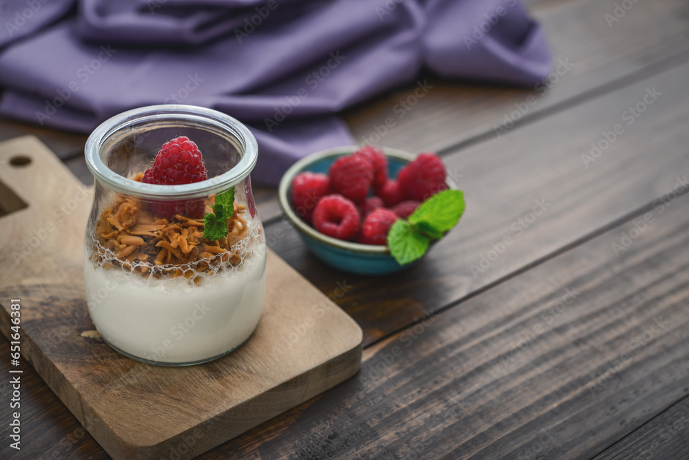 Dessert panna cotta with caramel cheese and fresh raspberry Dessert panna cotta with caramel cheese and fresh raspberry