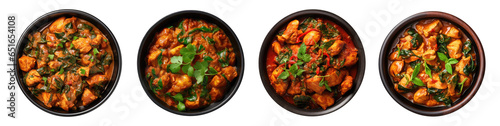 collection of Chicken Vindaloo with spinach in black bowl isolated on white or transparent background . Portuguese Influenced Indian dish made by cooking chicken in vindaloo spice paste.