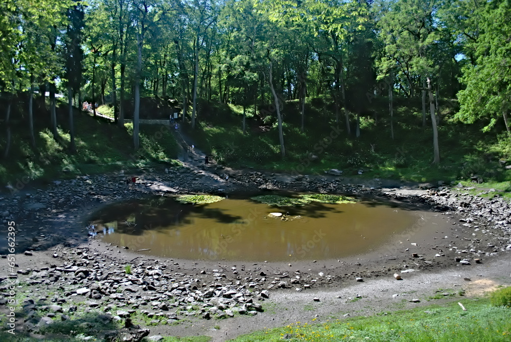 Fototapeta premium Kaali meteor crater valley. Saaremaa island. Estonia. Amazing mystical place.