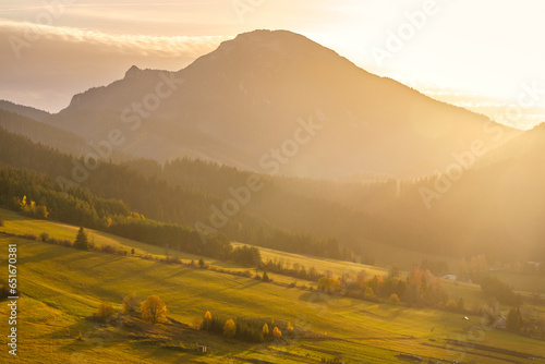 Autumn rural landscape with mountain at sunset. The Orava region of Slovakia, Europe.