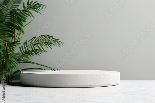 white round podium with a plant in it and a white vase with a green plant