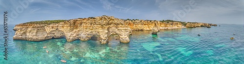 Panoramic drone picture over Praia do Marinha beach in Portuguese Algarve during daytime