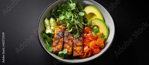Low carb lunch bowl with halloumi cheese avocado and salad greens