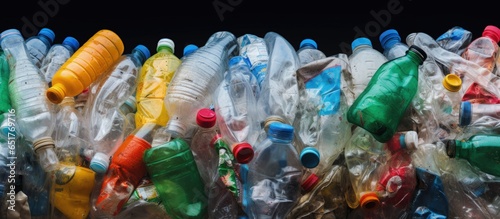 Recyclable plastic bottles in bales for sale collection and cleaning the environment photo