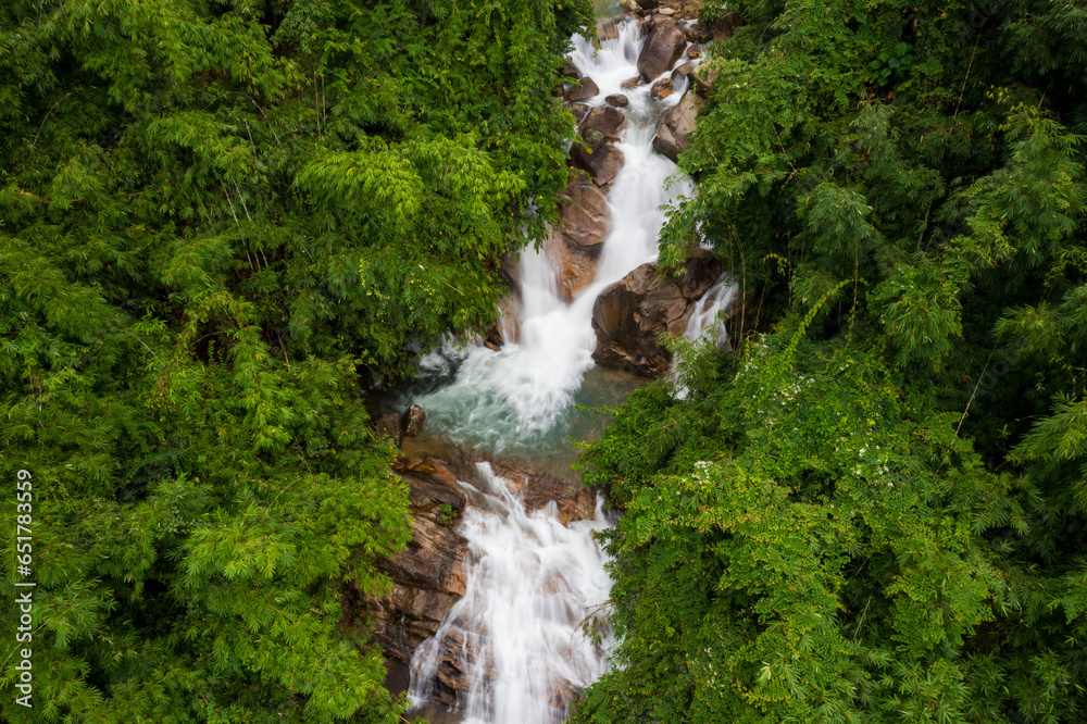 Krathing waterfall in the rainy season and refreshing greenery forest in the national park of Khao Khitchakut Chanthaburi province Thailand panorama aerial view for background. Krathing waterfall in the rainy season and refreshing greenery forest in the national park of Khao Khitchakut Chanthaburi province Thailand panorama aerial view for background.