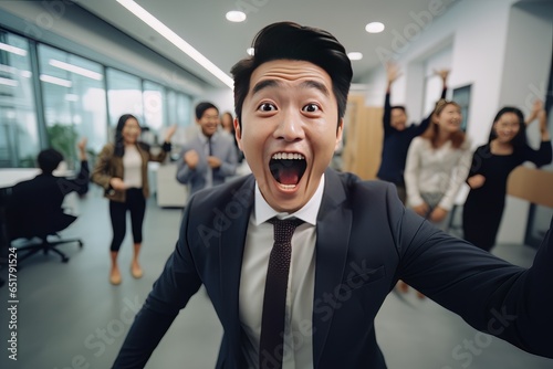 Happy Successful Asian Businessman Celebrating in Modern Office, Celebrate Success and Achieving Goals, Male Entrepreneur Celebrate Winning Moments.