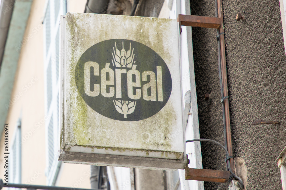 cereal brand logo and sign text front of bread wall facade french