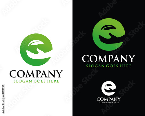 hand and leaf letter e logo