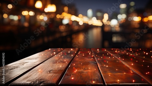 Wooden table in front of night city bokeh lights background