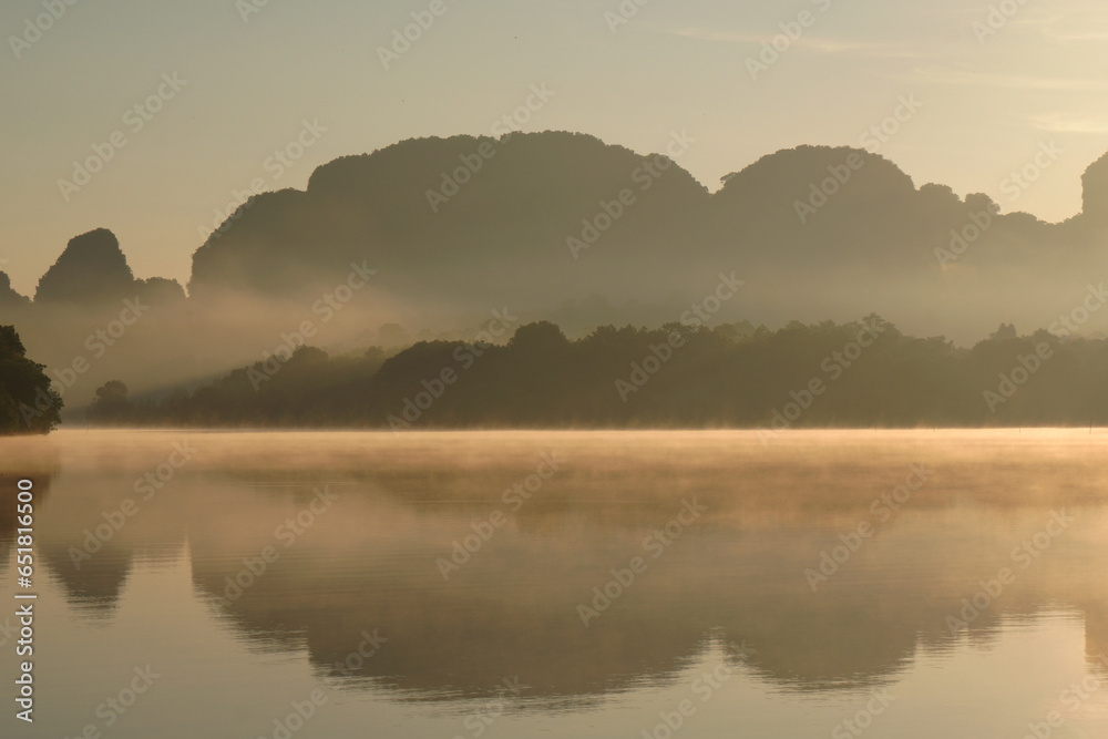Landscape Nature View of Nong Thale Lake in Krabi Thailand -beautiful limestone mountain with reflection on the lake Morning Sunrise view. Unseen In Krabi 