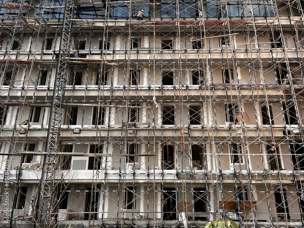 construction of buildings, apartments using scaffolding