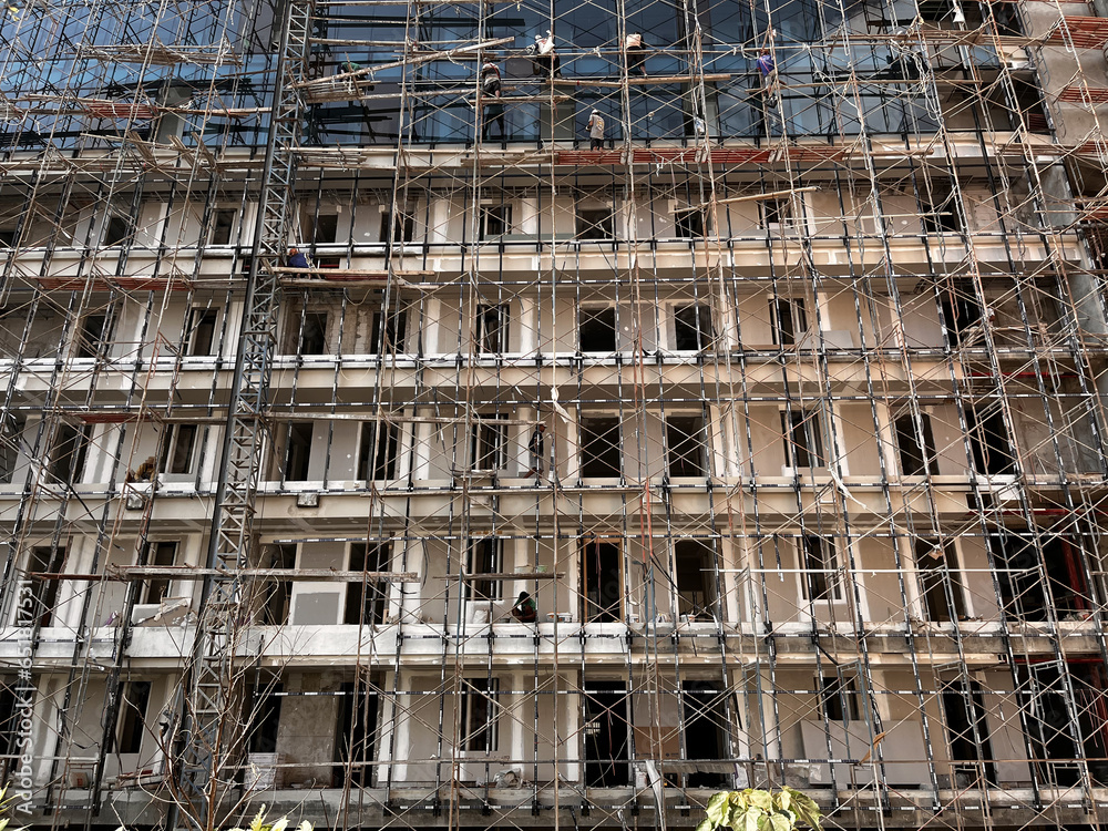 construction of buildings, apartments using scaffolding