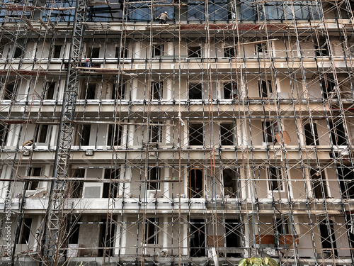 construction of buildings, apartments using scaffolding
