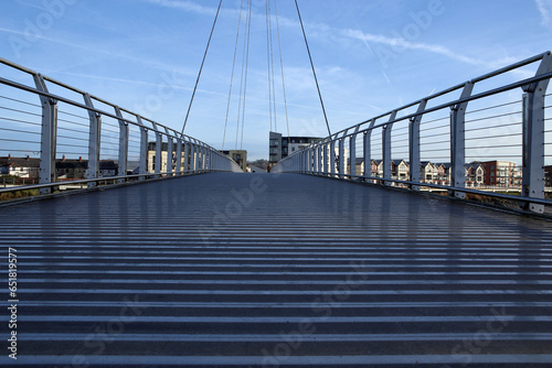 Newport City footbridge is a pedestrian and cycle bridge over the River Usk, in the city of Newport, South Wales, United Kingdom. photo