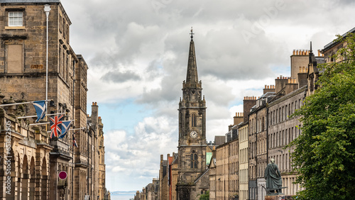 Picturesque buildings of great beauty on the main avenue of the Royal Mile in the center of Edinburgh, Scotland. photo