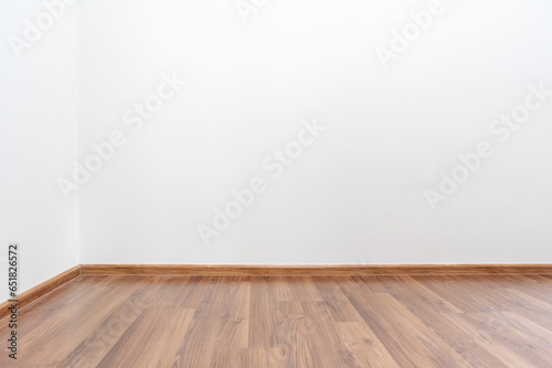 wooden floor and white wall background,  empty space for relaxing in the house minimal. © chathuporn