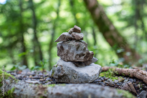 Pile of rocks on a forest trail, cairn