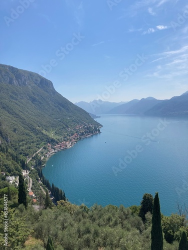 Colourful amazing facades of Italy buildings in the lake, river, sea and in the city center. Sunny day in Italy. Sightseeing in Milano, Genoa, Varenna, Bergamo, Lake Como. Old buildings Italy and sky
 photo