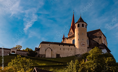 Church with a fortress on a sunny summer day at Rankweil, Feldkirch, Vorarlberg, Austria photo