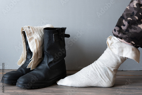 Boots and footcloths are a military and tourist form of clothing.