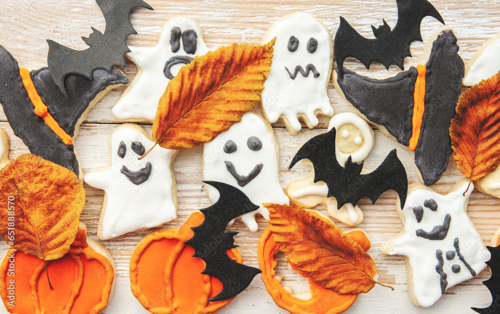 Halloween cookies - pumpkin Jack o Lantern, ghost and witch hat sweets. holidays background