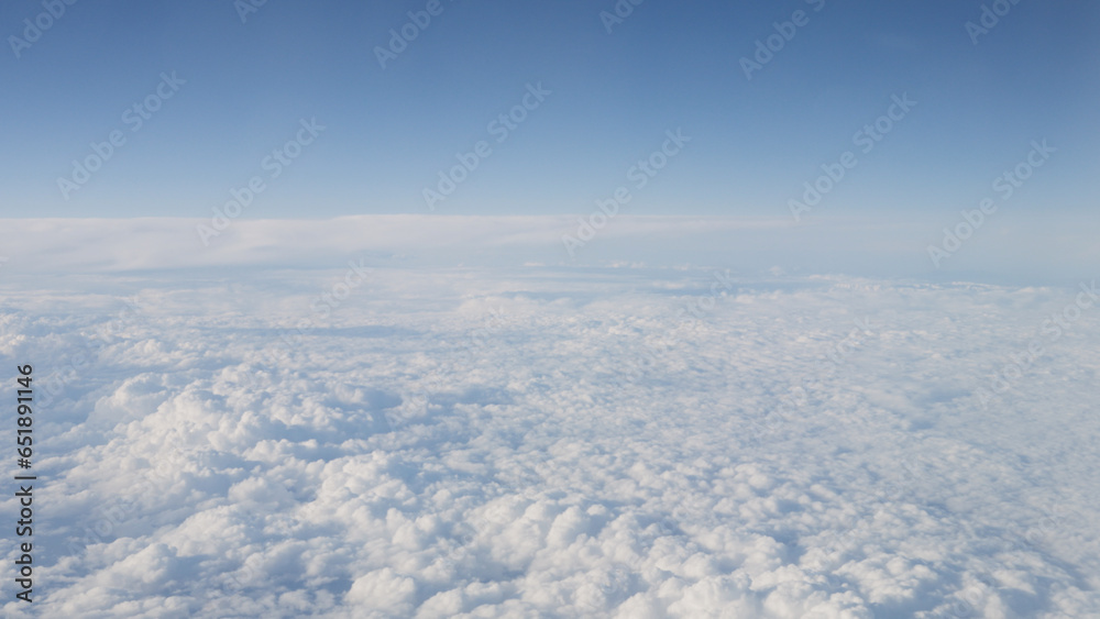 Airplane shot, flying over white clouds over europe Airplane shot, flying over white clouds over europe
