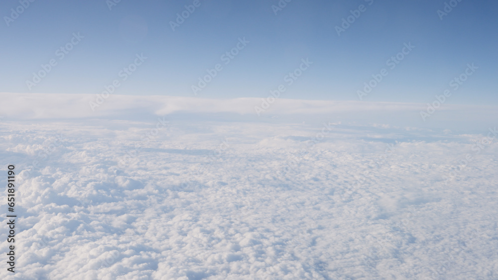 Airplane shot, flying over white clouds over europe Airplane shot, flying over white clouds over europe